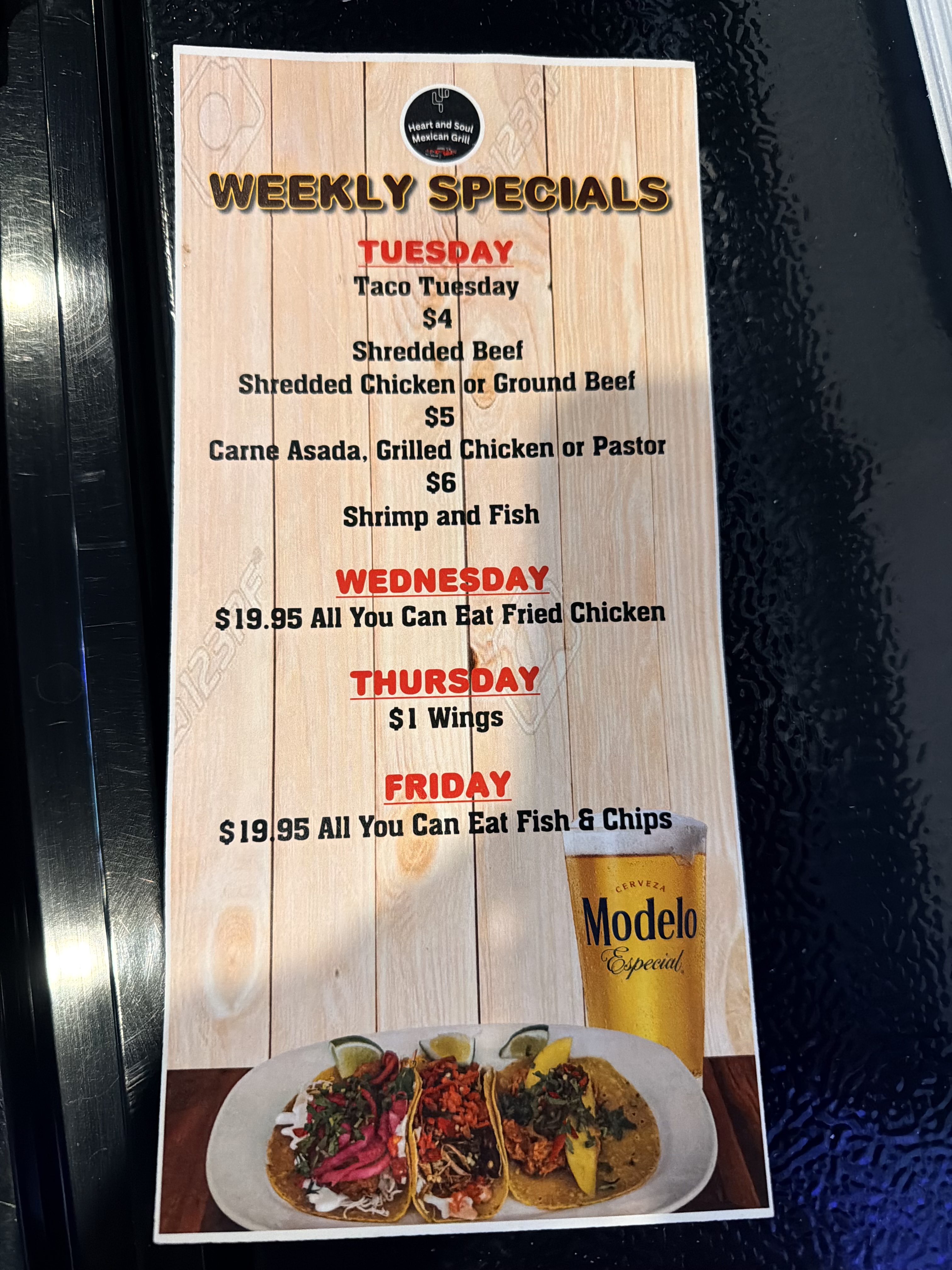 Weekly specials including Taco Tuesday, fried chicken Wednesday, wings Thursday, and fish and chips Friday.